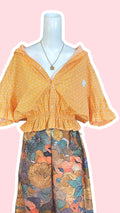 Intemporelle • T. 38 à 42 • Chemise crop orange à motifs