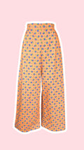 Pants • Taille XS/S • Pantalon upcyclé effet jeans orange à fleurs bleues