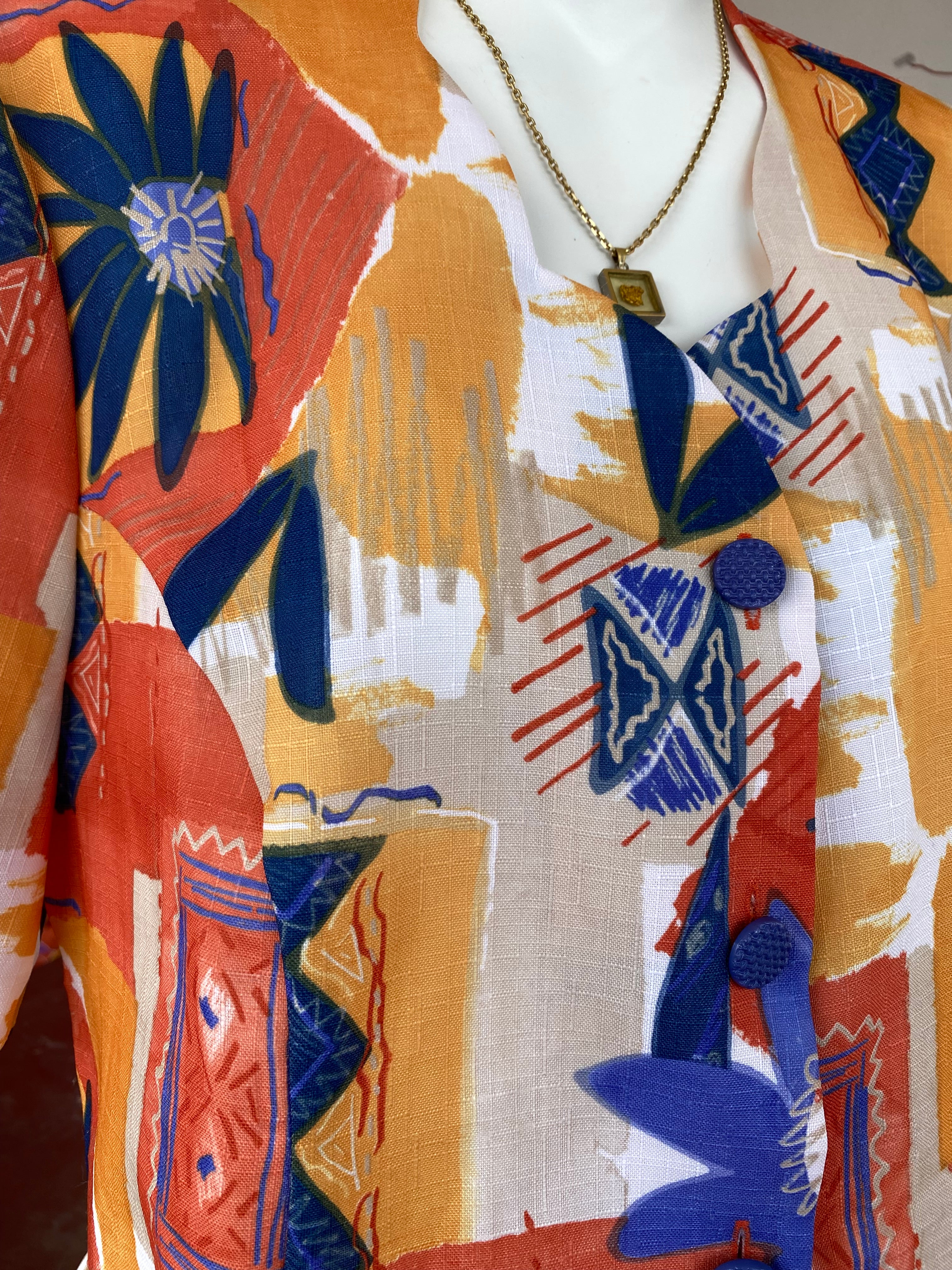 Froufrou • T. 36 à 38 • Chemise crop top orange et bleue motifs