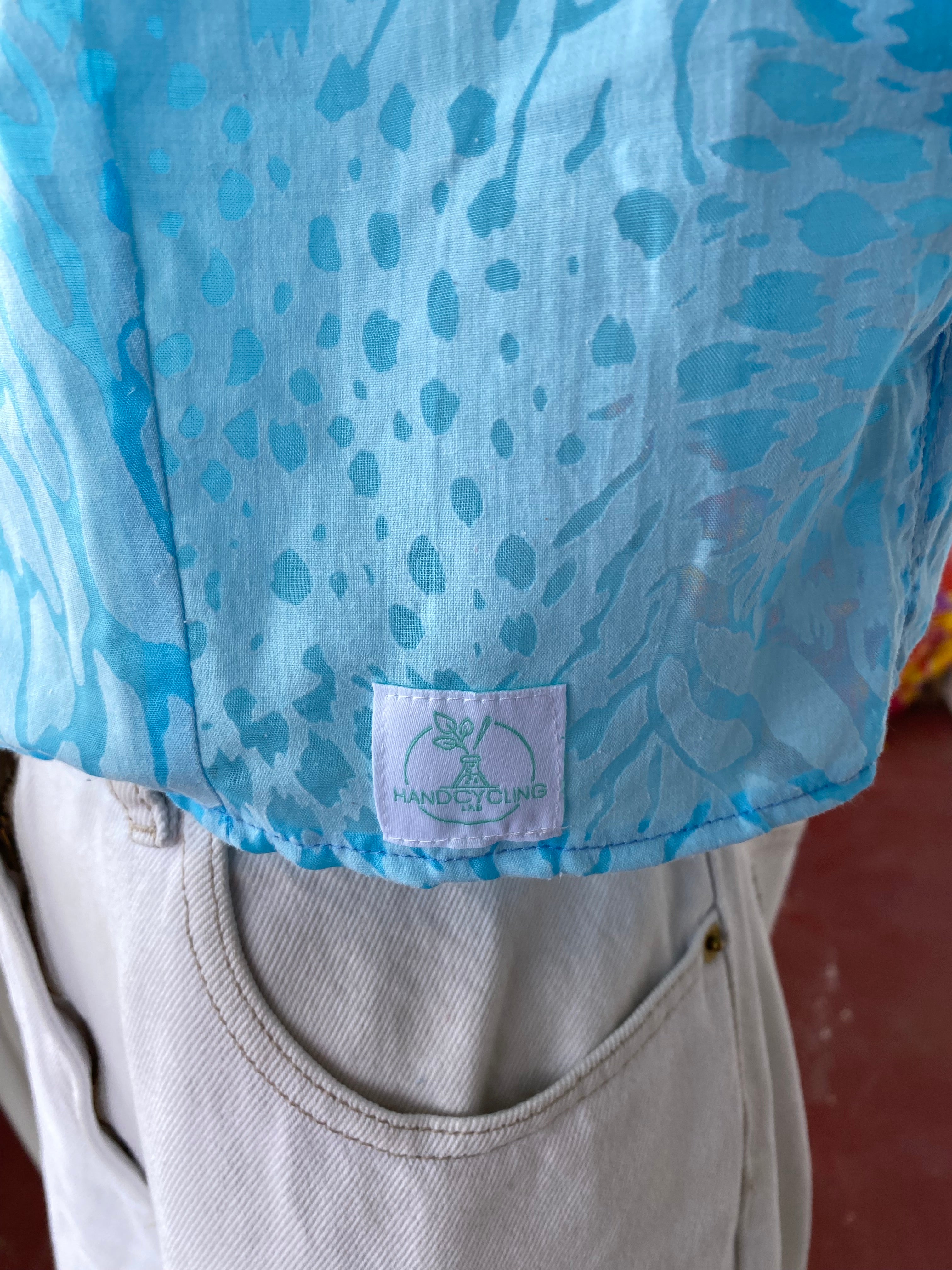Cropped • T. 36 à 40 • Chemise crop top turquoise motif animal transparent